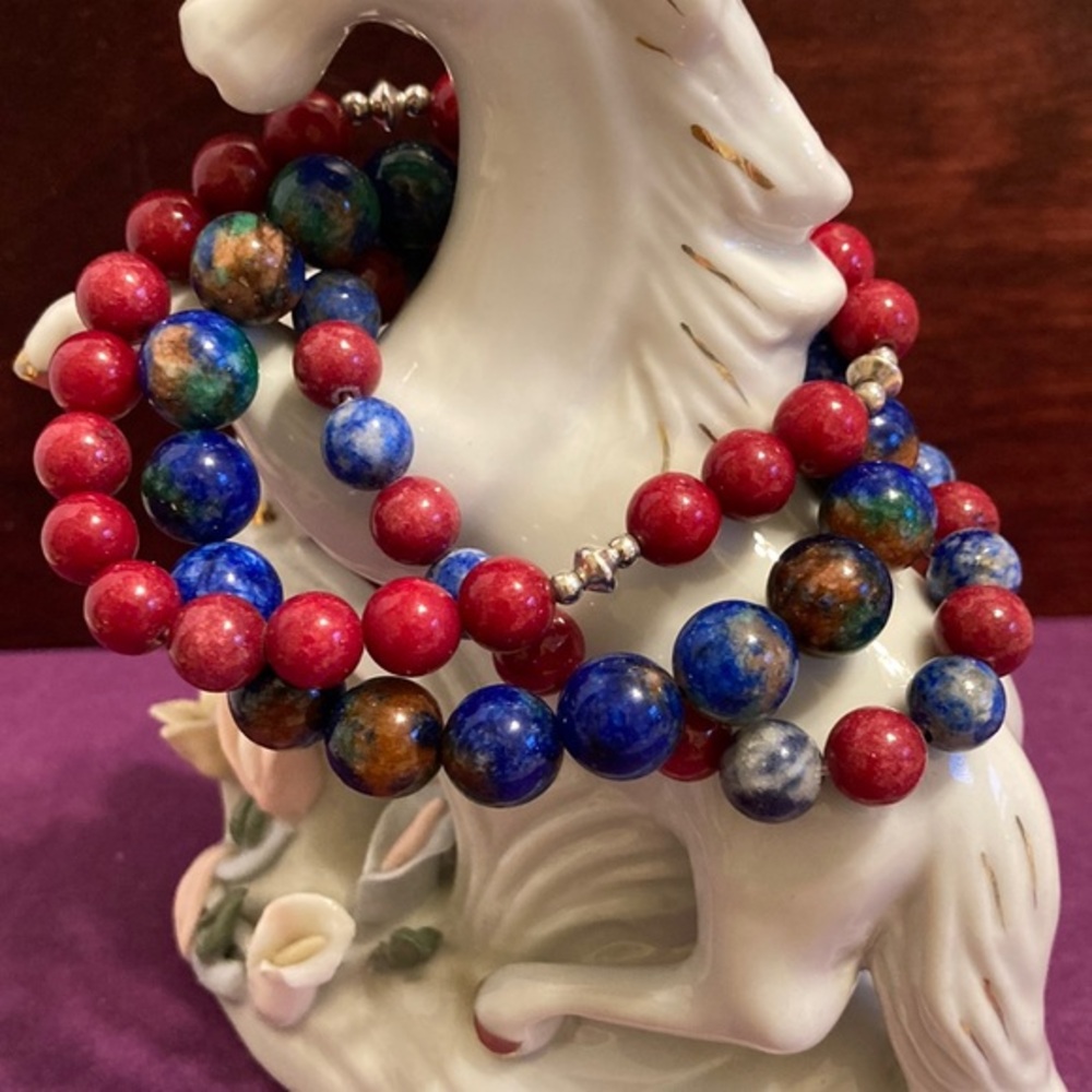 Glass beaded bracelet set in blues and reds